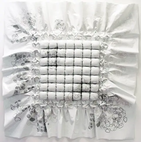 Jillian Hurst - cross stitch on vinyl upholstery