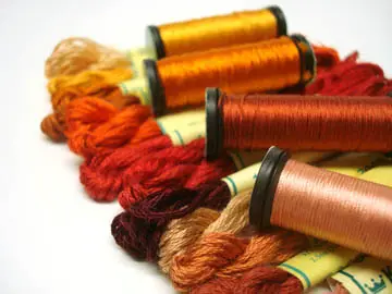 Samples of spun and filament silk threads
