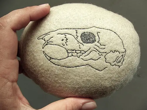 Skull embroidery on felt pebble by Smallest Forest