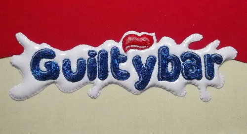 Guilty Bar. Hand embroidery by Charlotte Bailey.