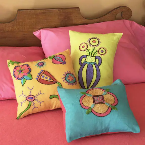 Kristen Nicholas - Crewel Pillows on Bed