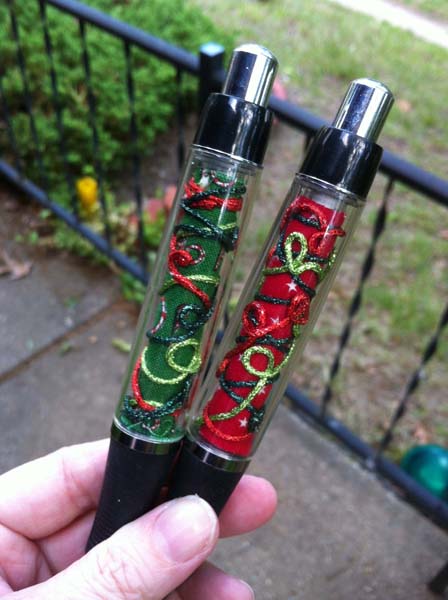 These pens were made by wrapping fabric scraps and metallic threads around the barrel of the Stitch-A-Pen.