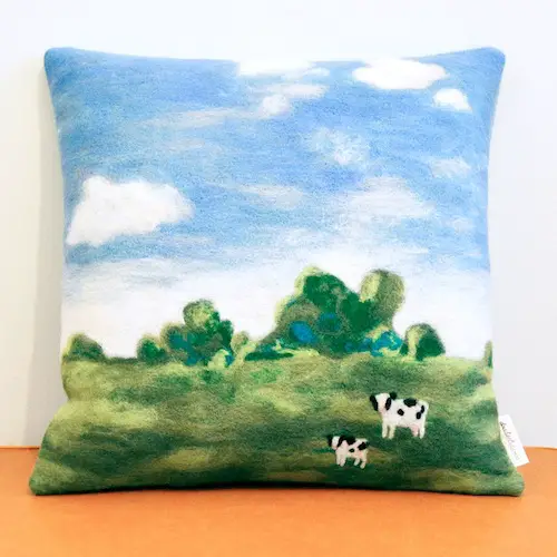 Cows on a Field Cushion by Doalittledance (Needle Felt)