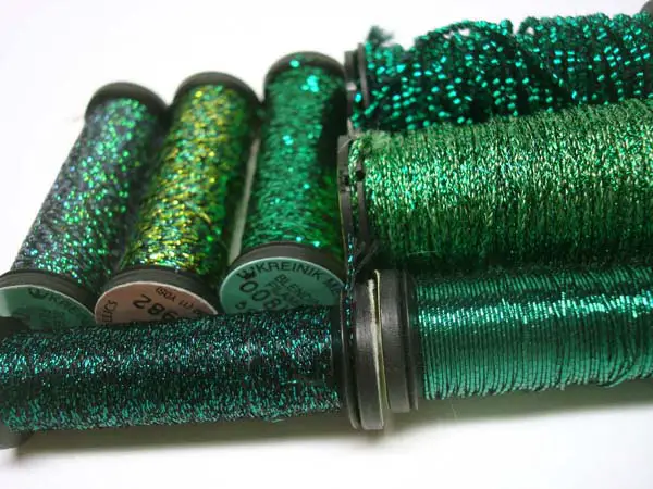 You can do shading with Kreinik's many shades of green.