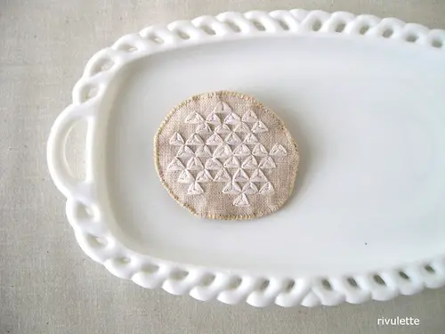 White Triangles Geometric Brooch by Rivulette (Hand Embroidery)