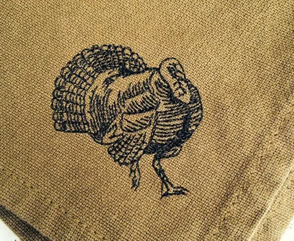Woodcut Turkey Machine Embroidery Design on Napkin by Erich Campbell
