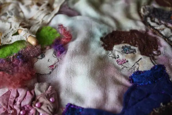 Faces close-up: Embroidery inspired by The Torn Umbrella painting, Ailish Henderson