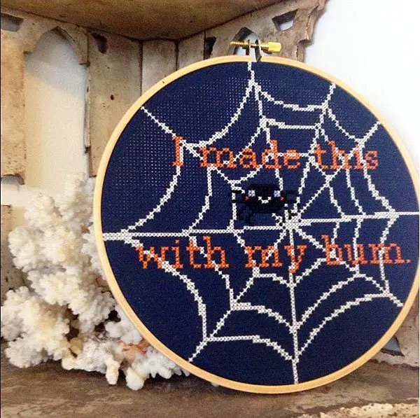 Looking at one of my favorite designs in Kari's line, don't you think this spider web would be awesome stitched in Kreinik's glow-in-the-dark color 052F?