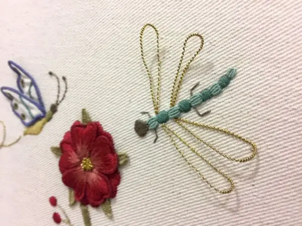 One of the most popular themes in needlework today is recreating bugs in stitches and threads. Look at the fabulous wings on this dragonfly! Project from the San Francisco School of Needlework and Design.