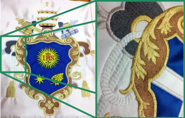 Overlapping details in heraldic banner embroidery by Erich Campvell