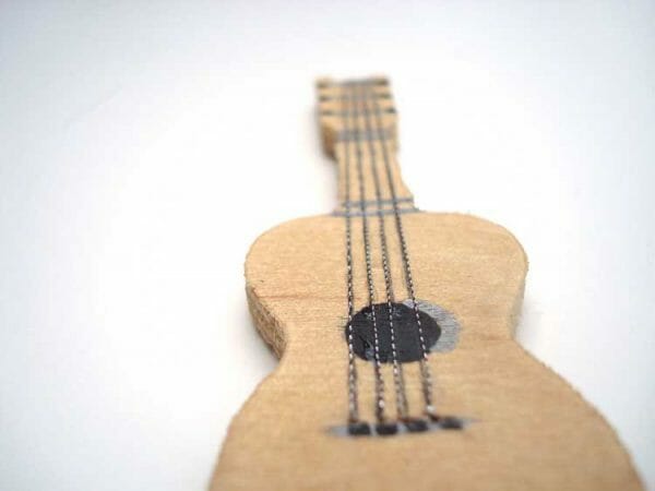 The very thin Kreinik Cord looks perfect as guitar strings on this dollhouse miniature.