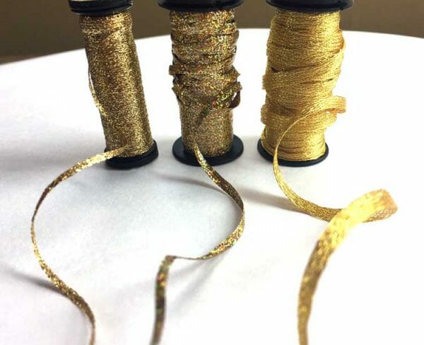 Not just for stitching? These gold Kreinik ribbons would look pretty woven into an elegant updo, or wrapped around a wedding bouquet, or as Christmas ornament hangers. 