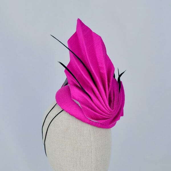 Bright pink hat by Sally Caswell