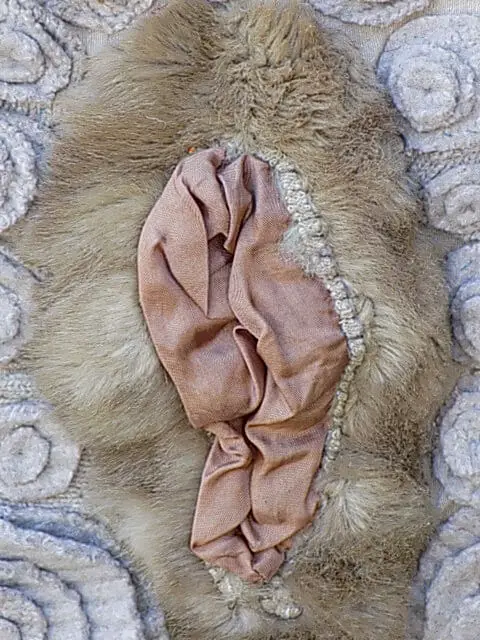 Using found objects in art: the pocket from a fur coat becomes a fabulous vagina.
