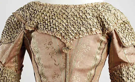 © Met Museum. Smocked 18th century dress