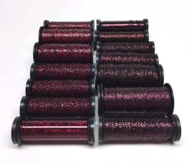 You can go light or dark with your Marsala preferences, or go red or blue in the hues. Pick a shade that speaks to your passion, design, and emotion. (Kreinik color 031L on the left, and 080HL on the right.)