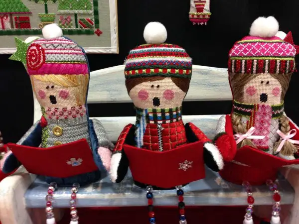 These creative carolers are part of the Christmas ornament series from needlepoint painted canvas design company Sew Much Fun.