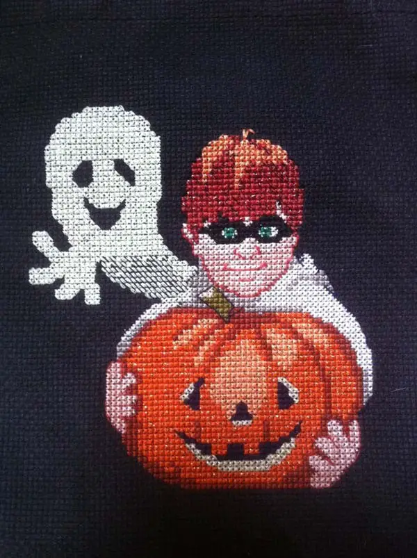 Here's an interesting idea for cross stitching a ghost: work a half-cross stitch for the nebulous vapor-y effect.
