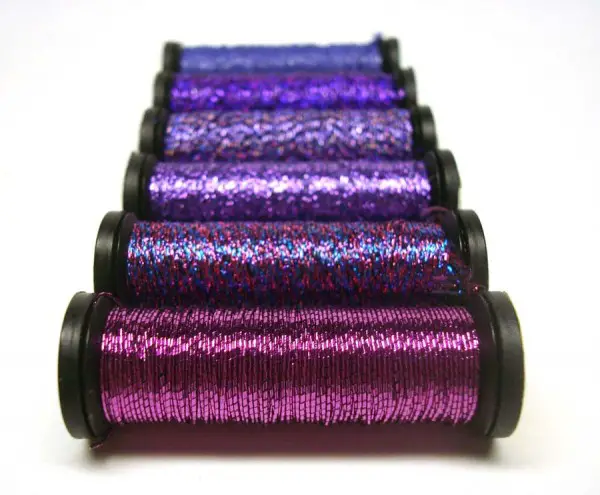 Purple reigns. So many shades, so many possibilities. These are all Kreinik metallic threads, my favorites for a few reasons: 1. the great color selection, 2. the quality. When you are playing with threads, threading your needle, needling with fibers, always, always use the best quality. You will not regret it.