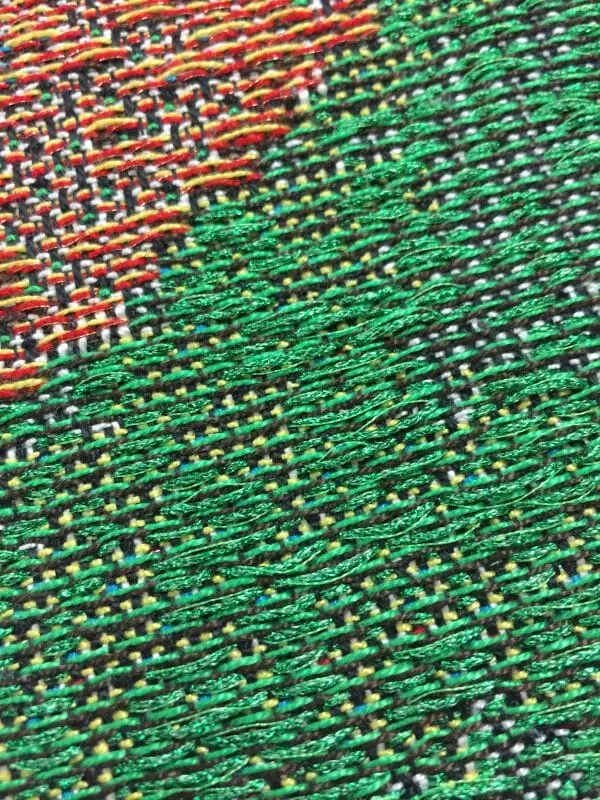 Keep your fibers nearby; they want to be used. Something fabulous will happen. Weaving with Kreinik metallic, by Trey Gehring.