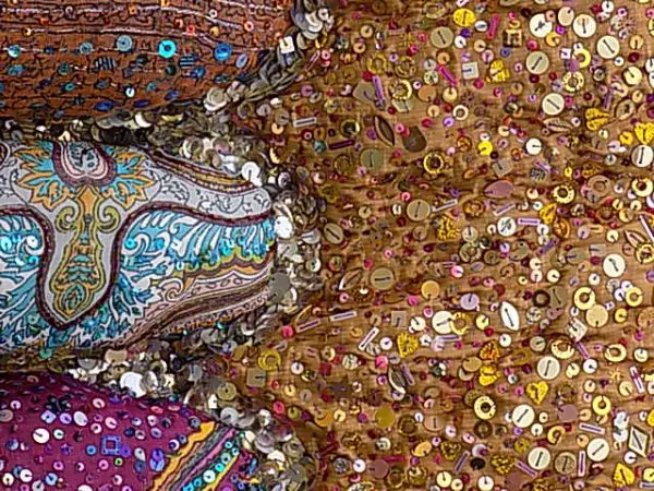 Light reflective beads and sequins enrich a single colour palette